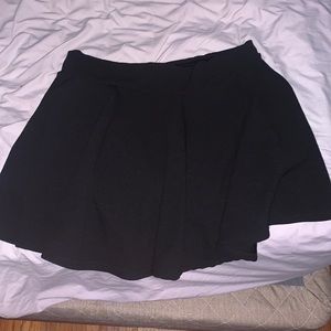 Black ruffled skirt with shorts underneath size L